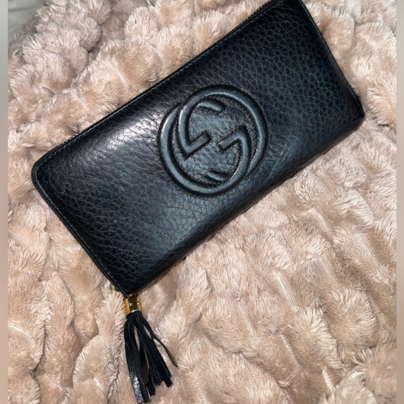 Gucci Handbags - Gucci Black Embossed Wallet
